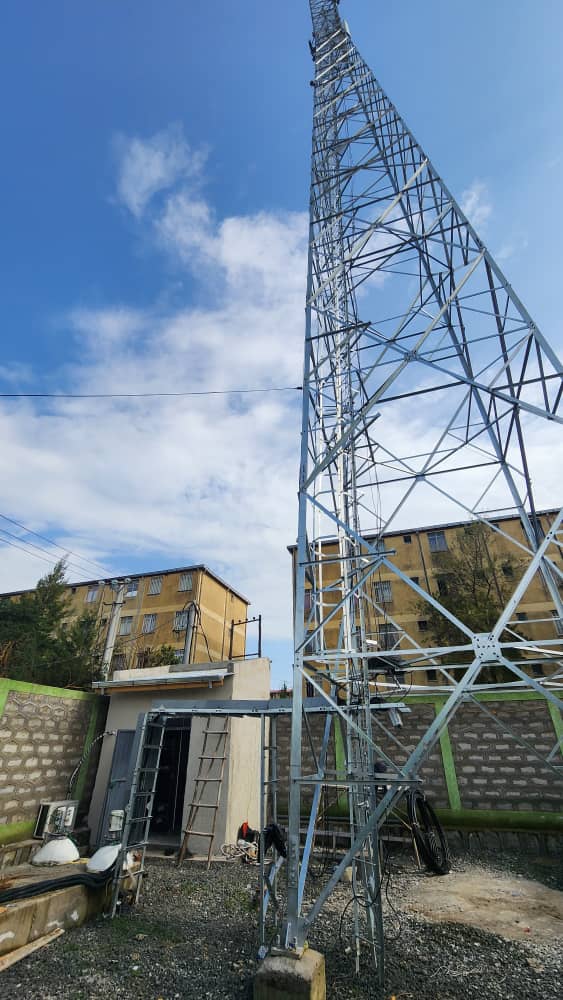 Tower with equipment shelter